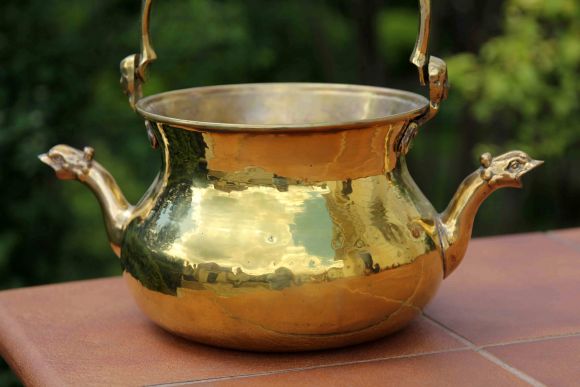 Старинный тяжёлый полированный двуносик из латуни