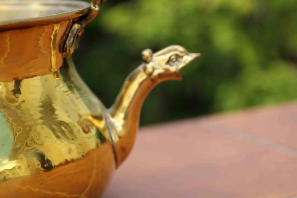 Старинный тяжёлый полированный двуносик из латуни