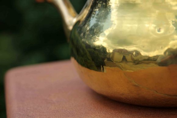 Старинный тяжёлый полированный двуносик из латуни