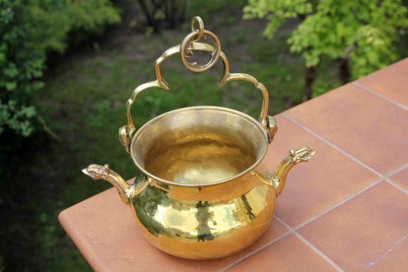 Старинный тяжёлый полированный двуносик из латуни