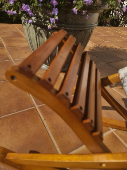 Винтажная качающаяся подставка для ног.