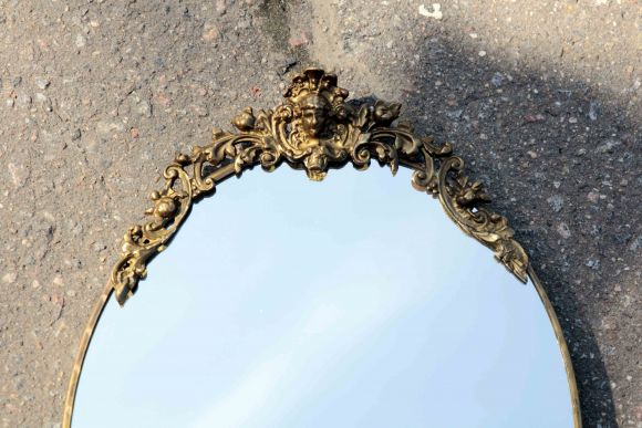 Интересное овальное зеркало в латуни
