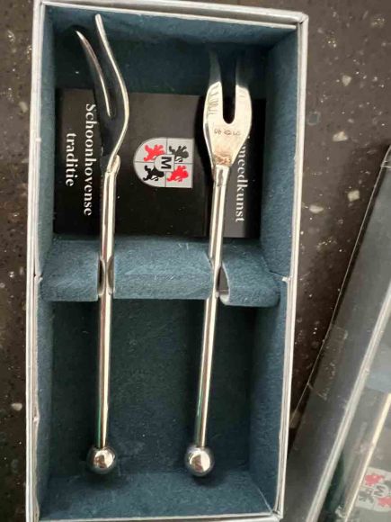 Серебряные коктейльные ложки и вилки для лимона.