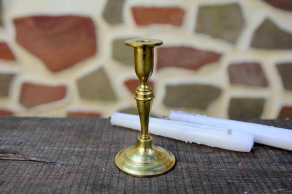 Старинный подсвечник на маленькую церковную свечу