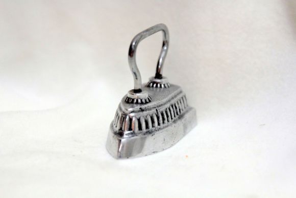 Маленький манжетный утюжок начала XX века. идеальное состояние