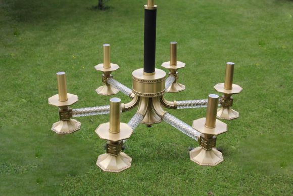 Очень интересная, необычная люстра из латуни.