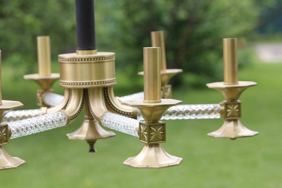 Очень интересная, необычная люстра из латуни.