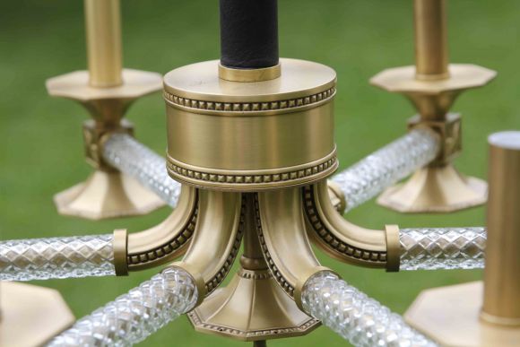 Очень интересная, необычная люстра из латуни.