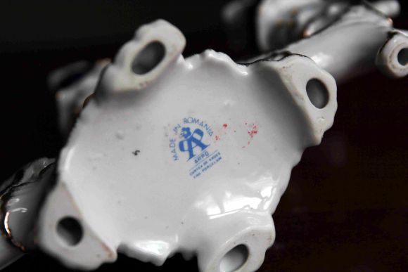 Сказочный фарфоровый подсвечник Путти