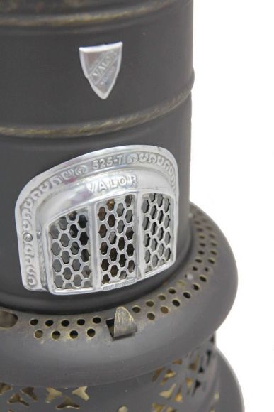 Керосиновая печь в рабочем состоянии. Великобритания. Начало 20 века