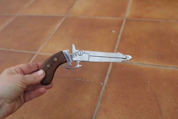 Винтажная открывалка в виде пистолета stainelesisteel.