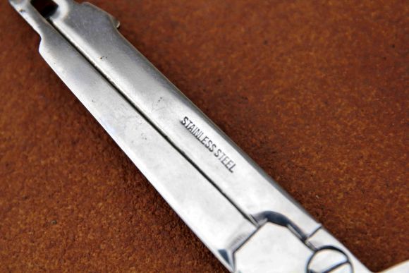 Винтажная открывалка в виде пистолета stainelesisteel.