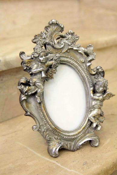 Винтажная рамка для фото с ПУТТИ В серебренной патине