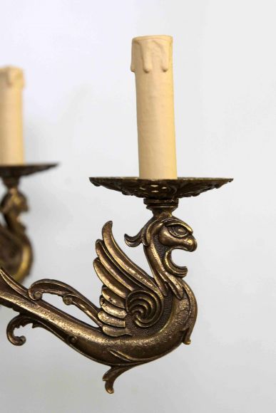 Бронзовая интересная люстра с Грифонами