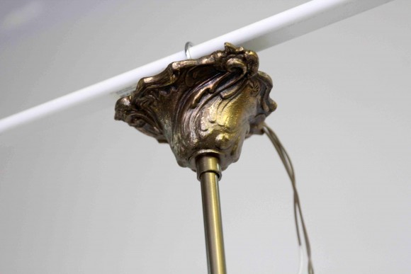 Бронзовая интересная люстра с Грифонами