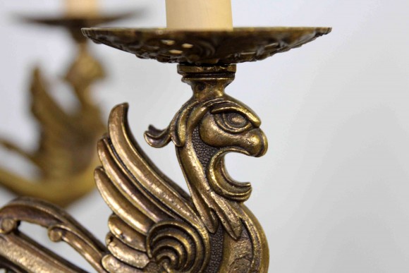 Бронзовая интересная люстра с Грифонами
