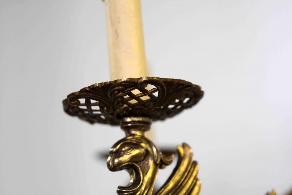 Бронзовая интересная люстра с Грифонами