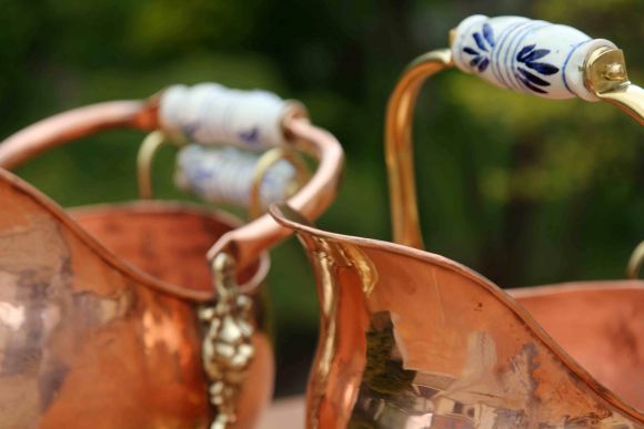 Пара отполированных медных больших зольников. Европа