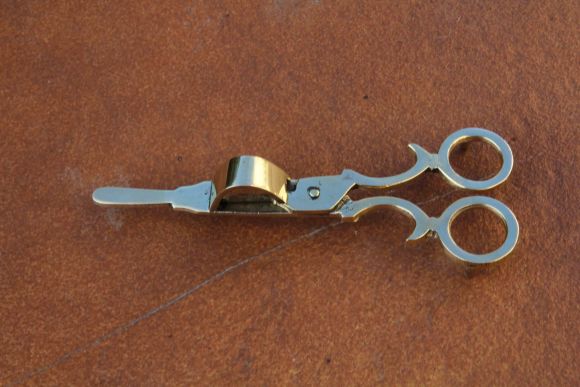 Латунный пламегаситель для свечи