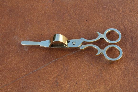 Латунный пламегаситель для свечи