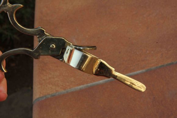 Латунный пламегаситель для свечи