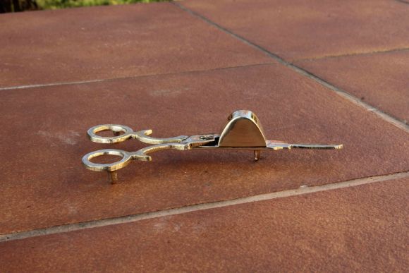 Латунный пламегаситель для свечи