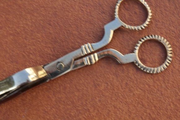 Полированный винтажный гаситель для огня