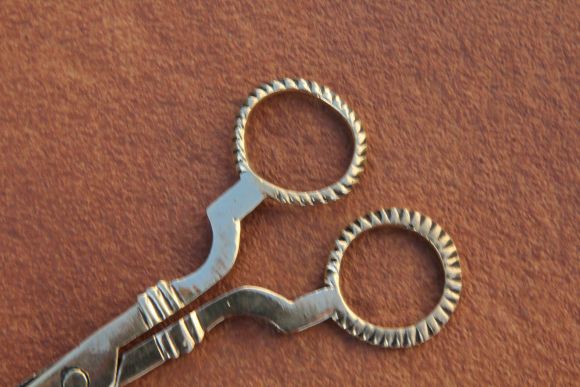 Полированный винтажный гаситель для огня