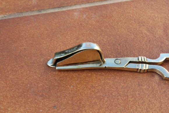 Полированный винтажный гаситель для огня