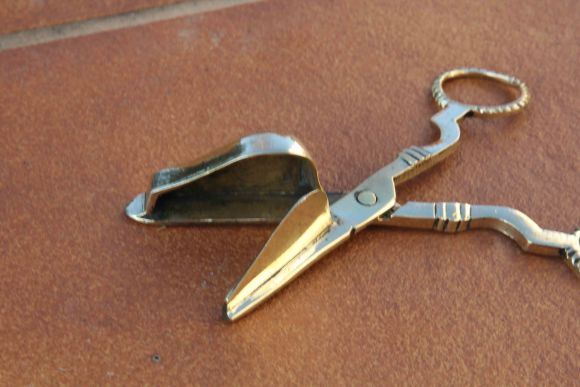 Полированный винтажный гаситель для огня