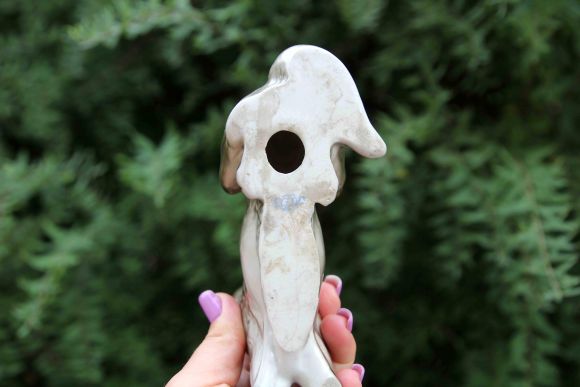 Фарфоровая статуэтка собаки